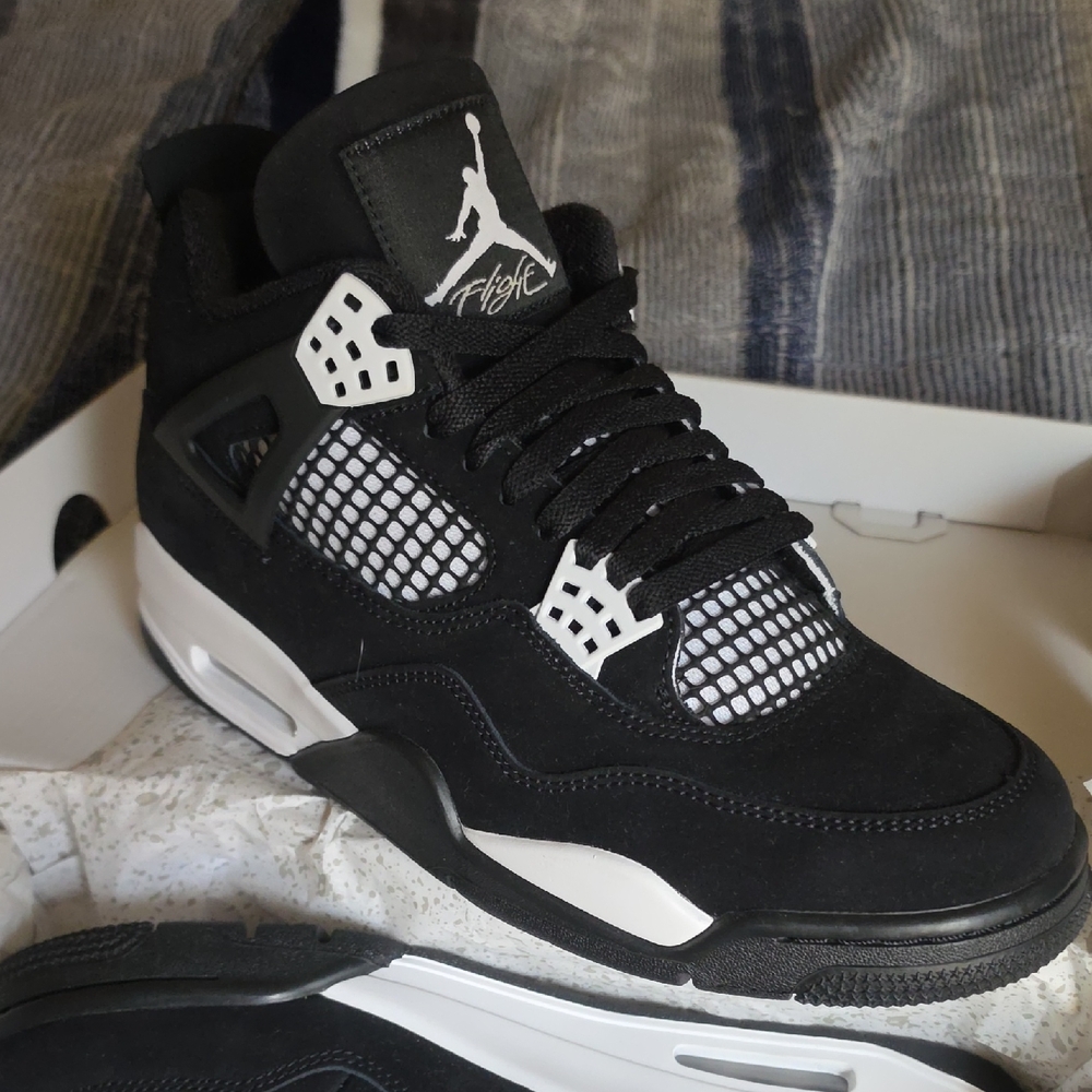 Jordan Black and White Retro Sneakers - Jumpman Detail